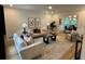 Bright living room featuring contemporary furniture, artwork, and natural light at 4601 Tall Pines Nw Dr, Atlanta, GA 30327