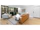Inviting living room with hardwood floors, a fireplace, and a cozy seating arrangement for relaxation at 4601 Tall Pines Nw Dr, Atlanta, GA 30327