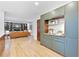 Inviting living space featuring custom built-ins, hardwood floors, and stylish decor at 4601 Tall Pines Nw Dr, Atlanta, GA 30327