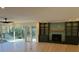 Large and welcoming living space with built-in shelves and big windows with backyard views at 4601 Tall Pines Nw Dr, Atlanta, GA 30327