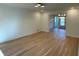 Open concept living room with hardwood floors, neutral walls, and natural light at 4601 Tall Pines Nw Dr, Atlanta, GA 30327