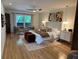 Spacious main bedroom with hardwood floors, neutral walls, and a large window at 4601 Tall Pines Nw Dr, Atlanta, GA 30327