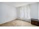 Bright room with carpeted floor, complemented by natural light from the window at 7847 Dogwood Way, Douglasville, GA 30134