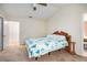 Bedroom with carpeted floors and a walk-in closet offers comfort and convenience at 7847 Dogwood Way, Douglasville, GA 30134