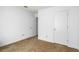 Bedroom with neutral-toned walls and carpeted floor, offering closet storage at 7847 Dogwood Way, Douglasville, GA 30134