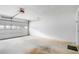 View of an attached garage with an automatic door and space for vehicle parking and storage at 7847 Dogwood Way, Douglasville, GA 30134