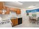 Bright kitchen features a breakfast nook and plenty of natural light, perfect for casual dining at 7847 Dogwood Way, Douglasville, GA 30134