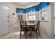 Cozy breakfast nook with a table and seating by a bright window at 7847 Dogwood Way, Douglasville, GA 30134