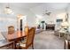 An open-concept living area and dining room offering a spacious and connected living space at 7847 Dogwood Way, Douglasville, GA 30134