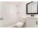 Clean bathroom with tiled shower, white vanity, and modern fixtures for a sleek design at 2174 Rexford Dr, Decatur, GA 30034