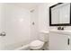Bright bathroom featuring a walk-in shower, a vanity, and modern fixtures at 2174 Rexford Dr, Decatur, GA 30034