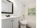 Fresh bathroom features a shower-tub combo and modern vanity at 2174 Rexford Dr, Decatur, GA 30034