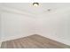 Bright bedroom features recessed lighting and wood-look flooring at 2174 Rexford Dr, Decatur, GA 30034