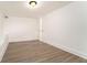 This bedroom features a closet and wood-look floors at 2174 Rexford Dr, Decatur, GA 30034