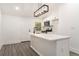 Kitchen featuring stainless steel appliances, white cabinetry, and an island with a sink at 2174 Rexford Dr, Decatur, GA 30034