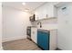 Kitchenette with stainless appliances and white cabinetry and countertops at 2174 Rexford Dr, Decatur, GA 30034
