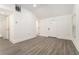 Bright living room with sleek, modern flooring and fresh white walls, creating a clean, open space at 2174 Rexford Dr, Decatur, GA 30034