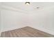 Finished room features new gray-toned flooring and fresh coat of bright white paint at 2174 Rexford Dr, Decatur, GA 30034