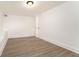 Finished room features new gray-toned flooring and fresh coat of bright white paint at 2174 Rexford Dr, Decatur, GA 30034