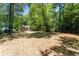 Expansive yard featuring lush greenery and mature trees, offering a serene outdoor retreat at 2174 Rexford Dr, Decatur, GA 30034