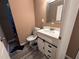 Bathroom featuring a vanity with storage and a view of the shower at 3230 Plymouth Rock Dr, Douglasville, GA 30135
