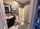 Bathroom with a toilet, sink, and shower at 3230 Plymouth Rock Dr, Douglasville, GA 30135