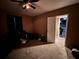 Bedroom with a ceiling fan, and a view of an additional room through a doorway at 3230 Plymouth Rock Dr, Douglasville, GA 30135