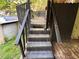 Staircase of the wooden deck with a view of the backyard at 3230 Plymouth Rock Dr, Douglasville, GA 30135