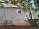 Exterior of a house showing damaged siding and possible structural issues at 3230 Plymouth Rock Dr, Douglasville, GA 30135