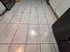 Close up of damaged tile flooring at 3230 Plymouth Rock Dr, Douglasville, GA 30135