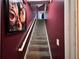 View of carpeted stairs with white railing, leading to the upper level of the home at 3230 Plymouth Rock Dr, Douglasville, GA 30135