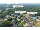 Aerial view of home, neighborhood, and nearby schools (Walton H.S. & Dodgen M.S.) and swim & tennis courts at 3495 Mill Bridge Dr, Marietta, GA 30062