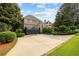 Spacious backyard featuring a sport court, lush lawn, and a deck perfect for outdoor entertaining at 3495 Mill Bridge Dr, Marietta, GA 30062