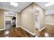 The basement has an open floor plan with a hallway leading to the bathroom and exercise room at 3495 Mill Bridge Dr, Marietta, GA 30062