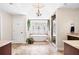 Luxurious bathroom with a soaking tub, decorative windows, and elegant fixtures at 3495 Mill Bridge Dr, Marietta, GA 30062