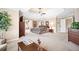 Large main bedroom with a tray ceiling, sitting area, and ensuite bathroom access at 3495 Mill Bridge Dr, Marietta, GA 30062