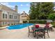 Relaxing pool with chairs and a table at 3495 Mill Bridge Dr, Marietta, GA 30062