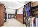 Large walk-in closet with ample shelving and storage for clothing and accessories at 3495 Mill Bridge Dr, Marietta, GA 30062