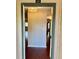 Condo entryway with decorative lighting and hardwood floors at 121 Brittany Ct, Duluth, GA 30096