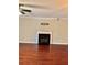 Cozy living room featuring a fireplace with black tile surround at 121 Brittany Ct, Duluth, GA 30096