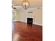 Spacious living room with hardwood floors and fireplace at 121 Brittany Ct, Duluth, GA 30096