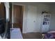 Bedroom showing a view into the doorway with a closet at 1504 Gallup Dr, Stockbridge, GA 30281