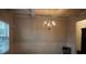 Dining room displaying the chandelier and trim work along the wall at 1504 Gallup Dr, Stockbridge, GA 30281
