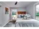Relaxing bedroom featuring decor, a window view, and light grey walls at 2162 Westover Dr, Atlanta, GA 30344