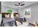 Cozy bedroom with two twin beds and decor at 2162 Westover Dr, Atlanta, GA 30344