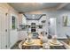 Bright kitchen with white cabinets, stainless steel appliances, and granite countertops at 2162 Westover Dr, Atlanta, GA 30344