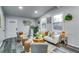 Bright living room with vaulted ceilings, new gray vinyl floors, and contemporary decor at 2162 Westover Dr, Atlanta, GA 30344