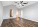 Spacious bedroom features a vaulted ceiling, ceiling fan, and wood-look floors at 2701 Log Cabin Se Dr, Atlanta, GA 30339