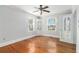 Charming bedroom with hardwood floors, natural light and a built-in cabinet at 2701 Log Cabin Se Dr, Atlanta, GA 30339