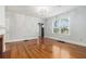 Bright living room features hardwood flooring, a brick fireplace and lots of natural light at 2701 Log Cabin Se Dr, Atlanta, GA 30339